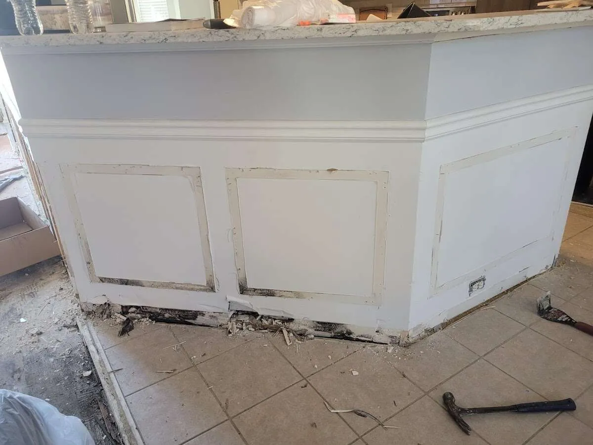 Water damage and mold on kitchen during Storm Damage Restoration in Mentone